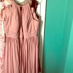 It is a brides maid dress.  Never worn .